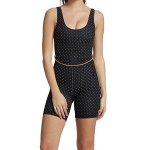 WeWoreWhat Polka Dot black onesie workout romper with gold chain belt